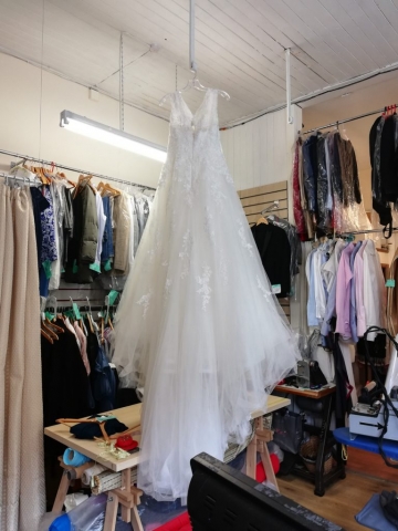 wedding dress in workroom